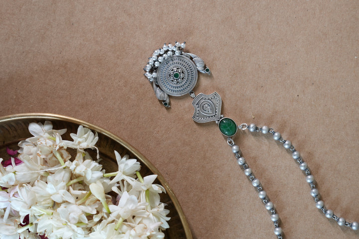 Temple-Inspired Oxidised Silver Pendant with Carved Green Stone