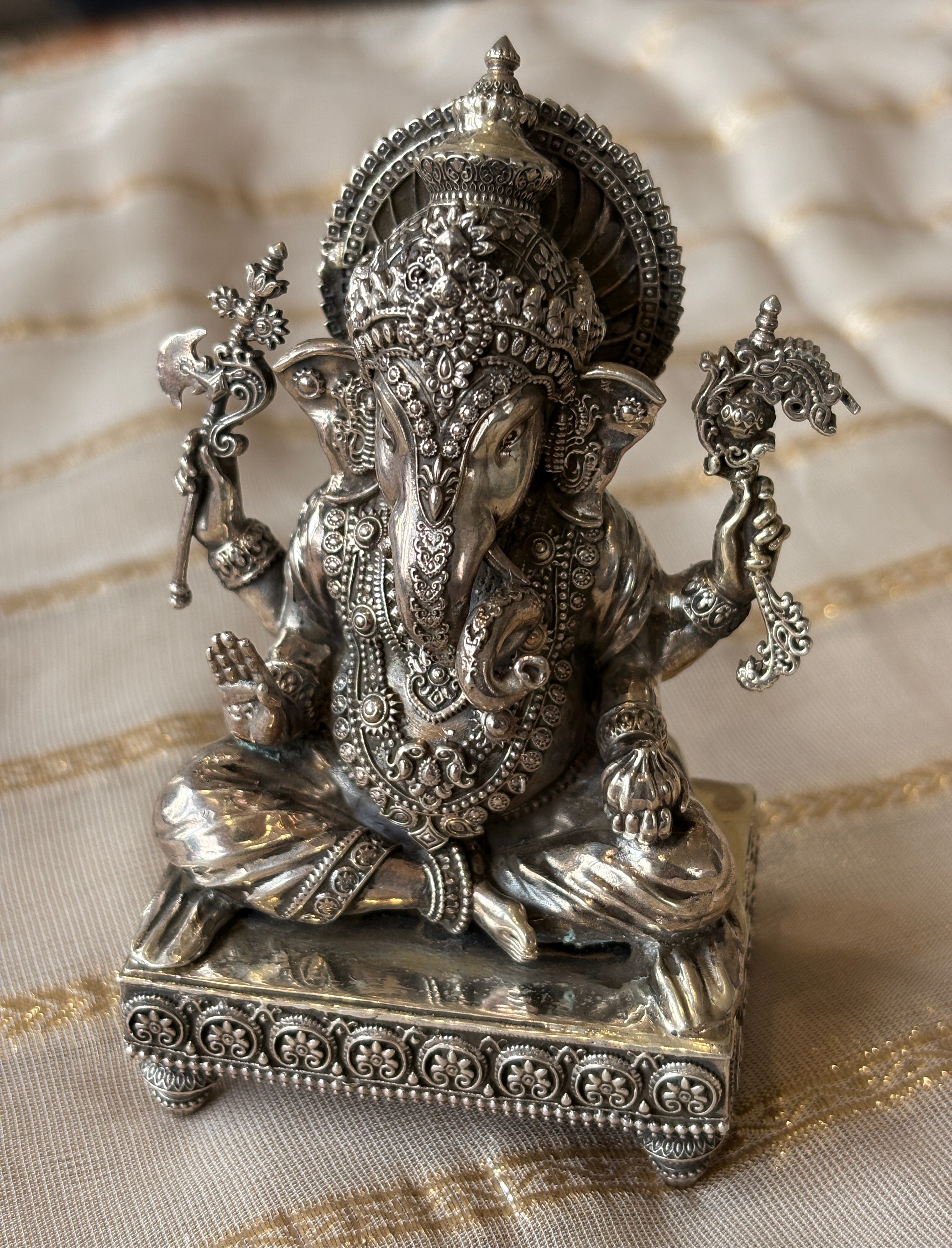 silver ganesh murti