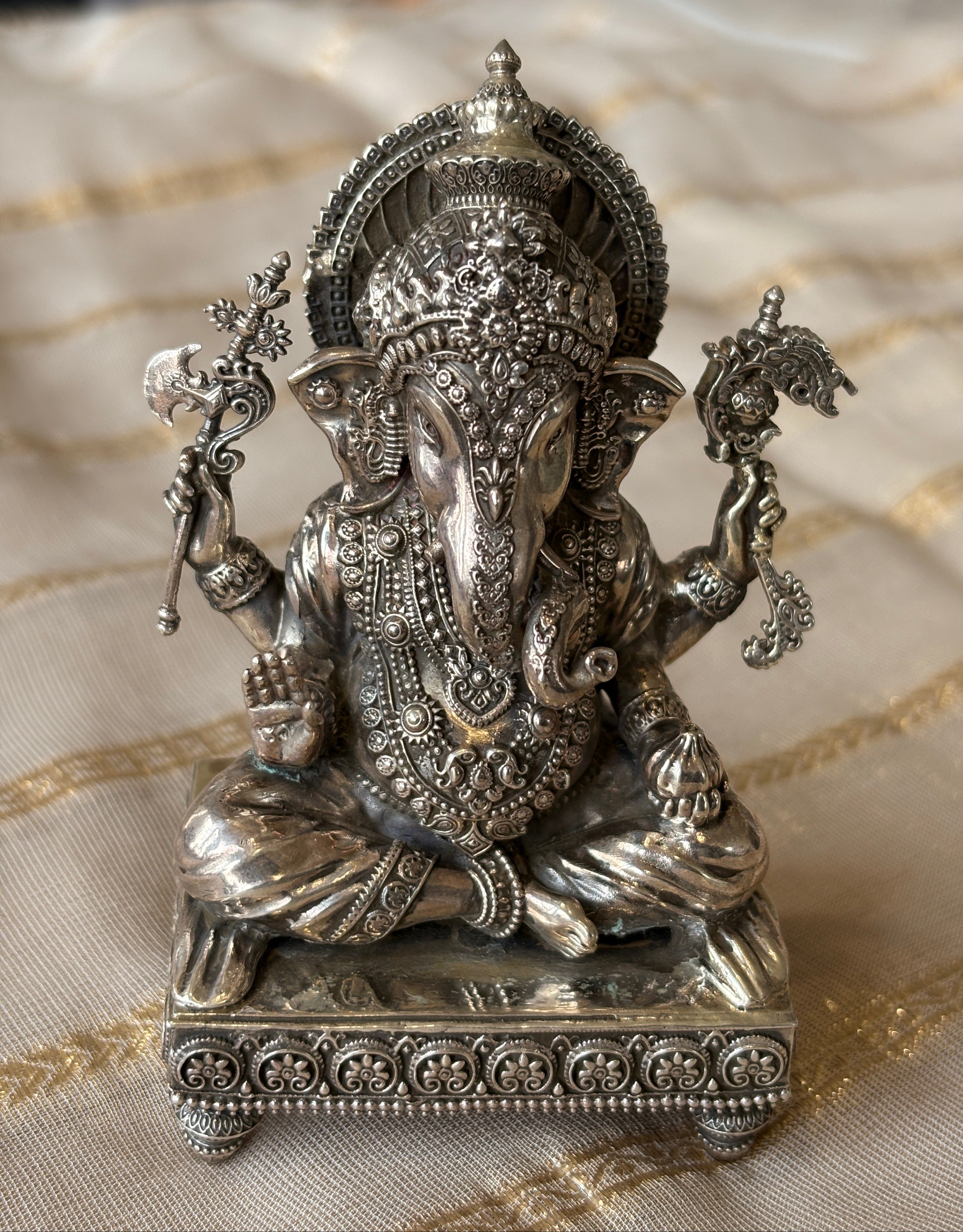 silver ganesh murti