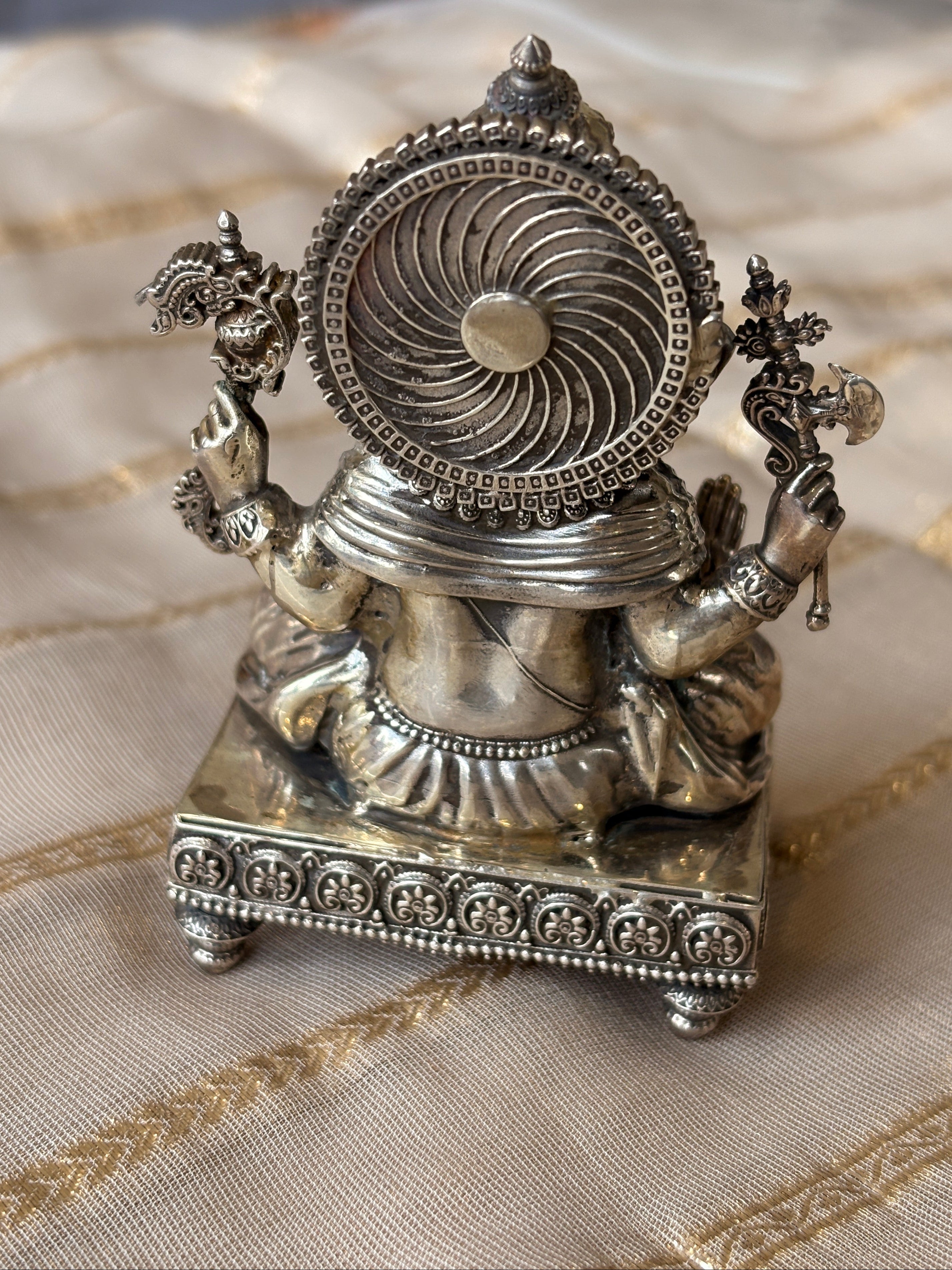 silver ganesh murti