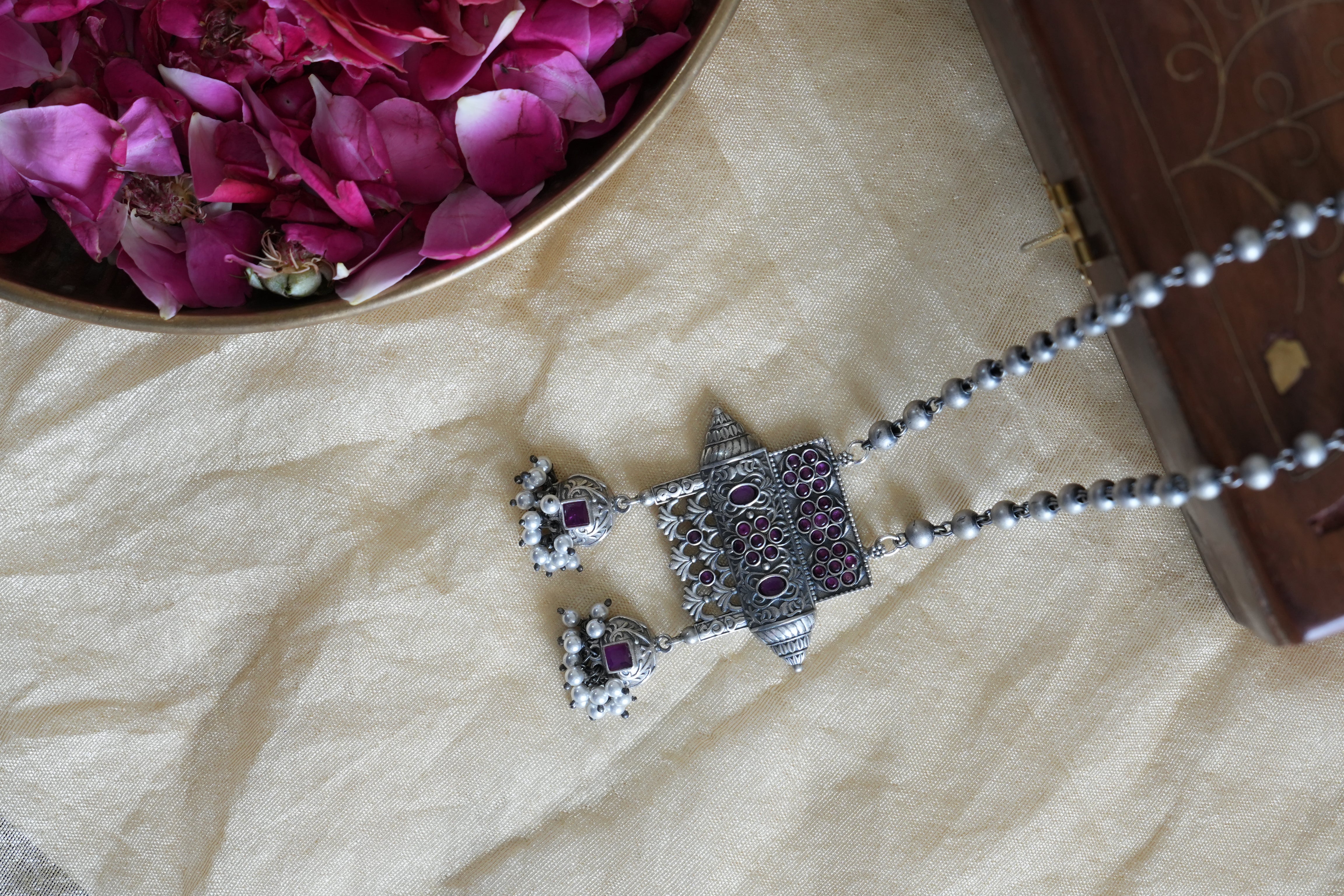 Temple-Inspired Oxidised Silver Pendant with Beads and Floral Detailing