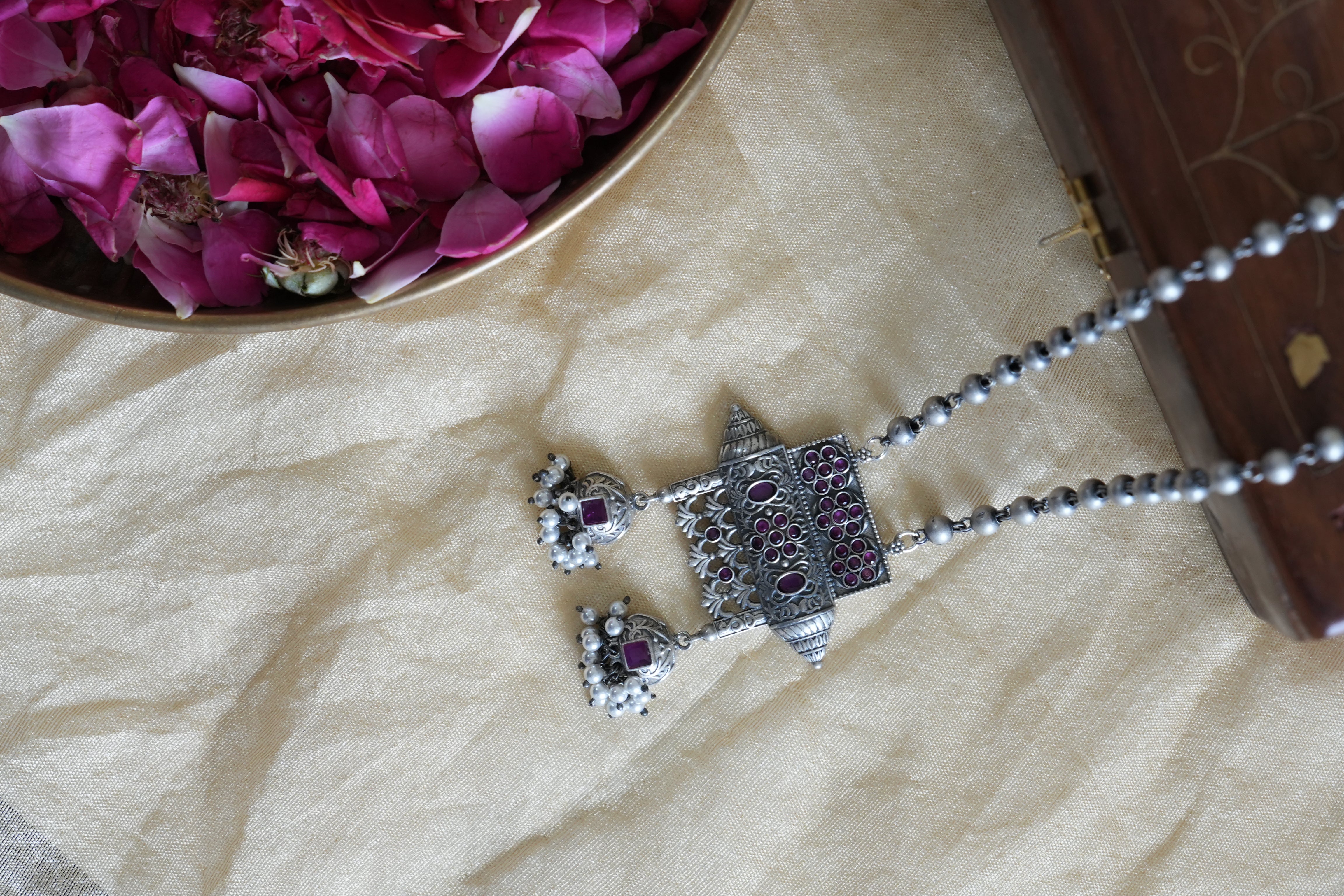 Temple-Inspired Oxidised Silver Pendant with Beads and Floral Detailing