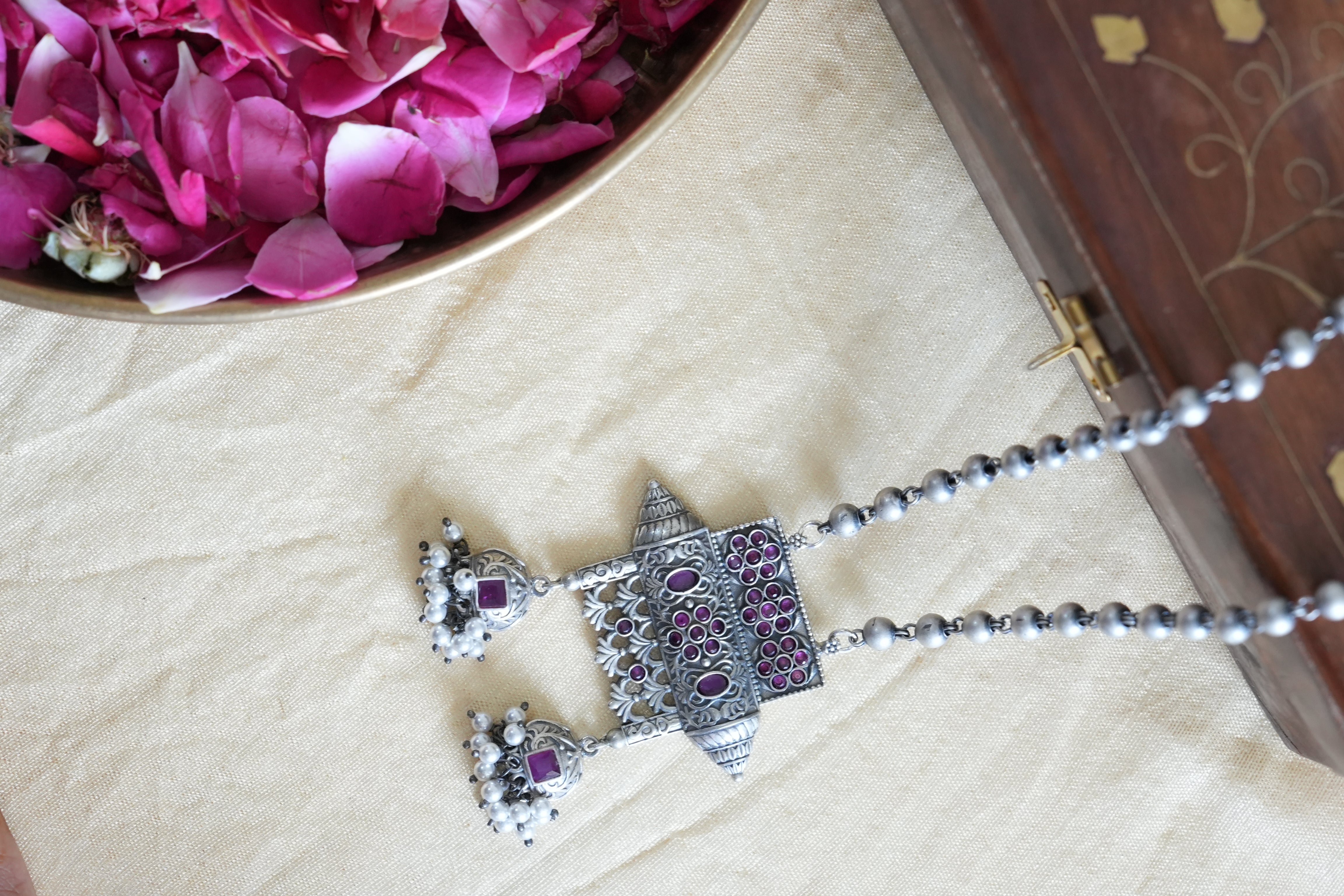 Temple-Inspired Oxidised Silver Pendant with Beads and Floral Detailing