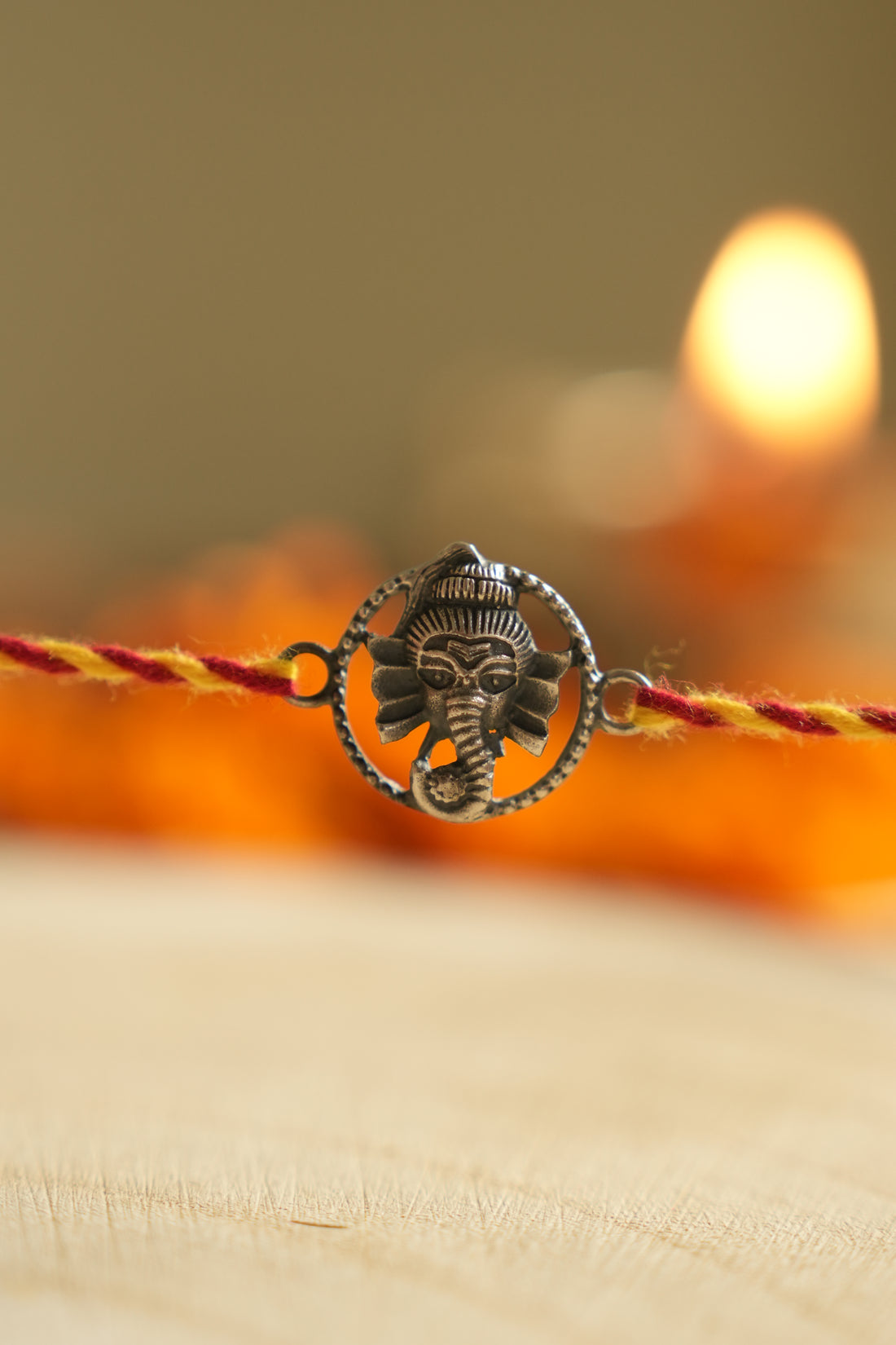 silver ganesh rakhi 