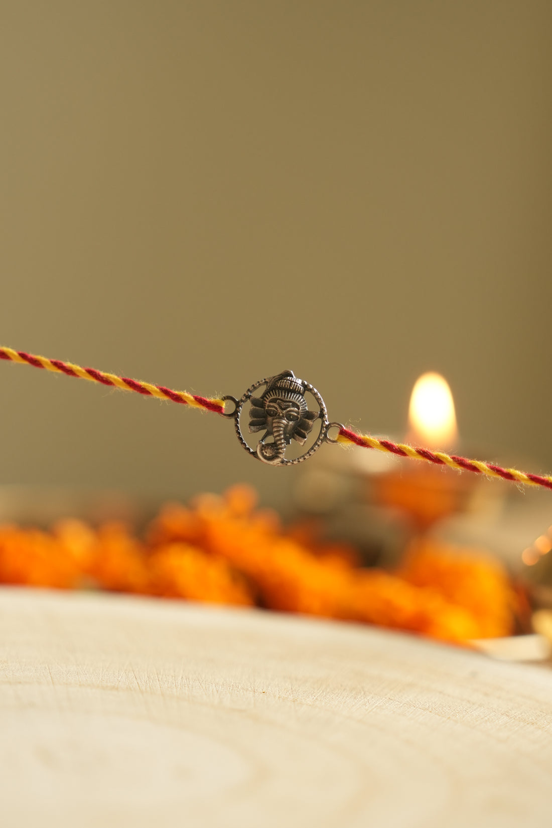 silver ganesh rakhi 