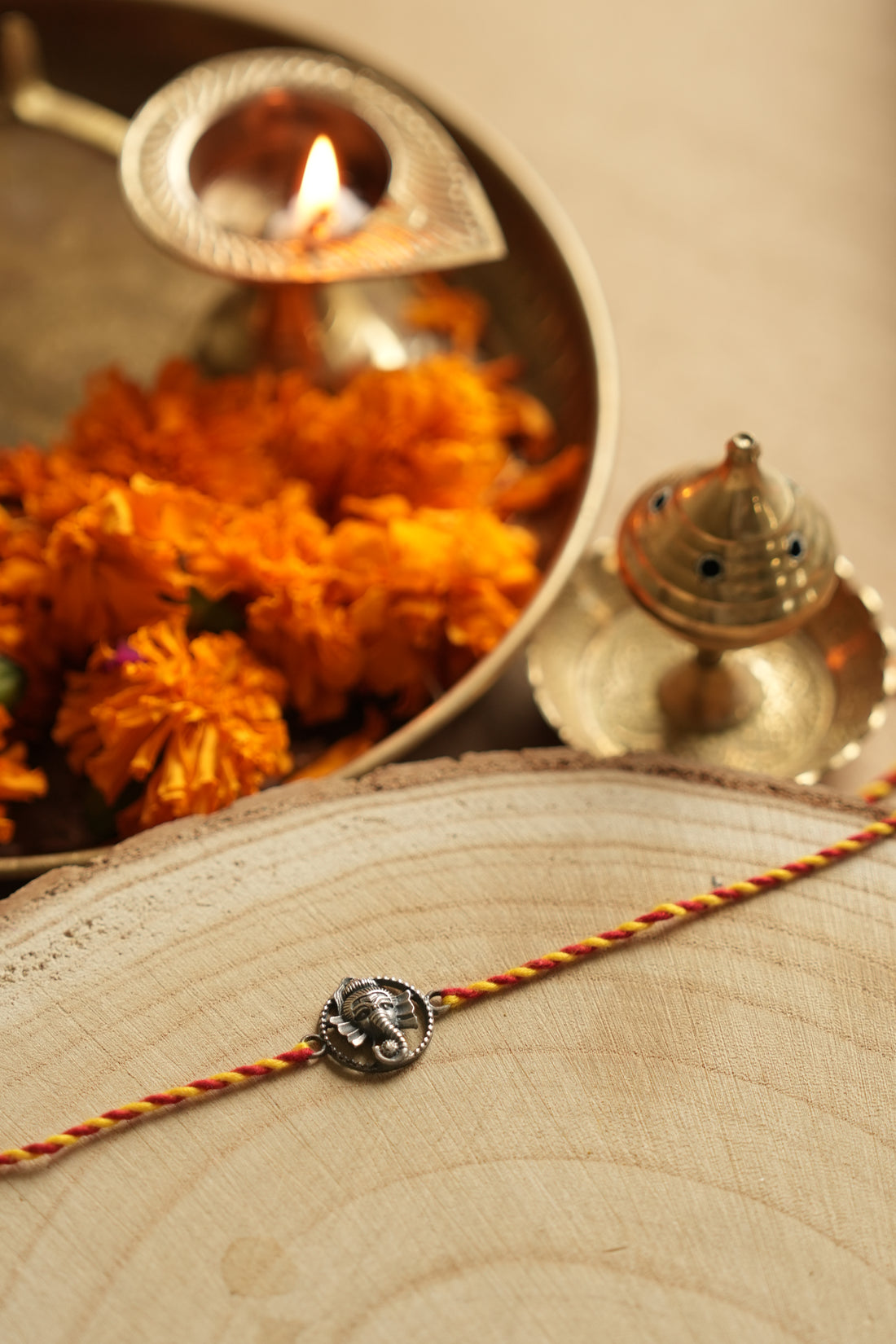silver ganesh rakhi 