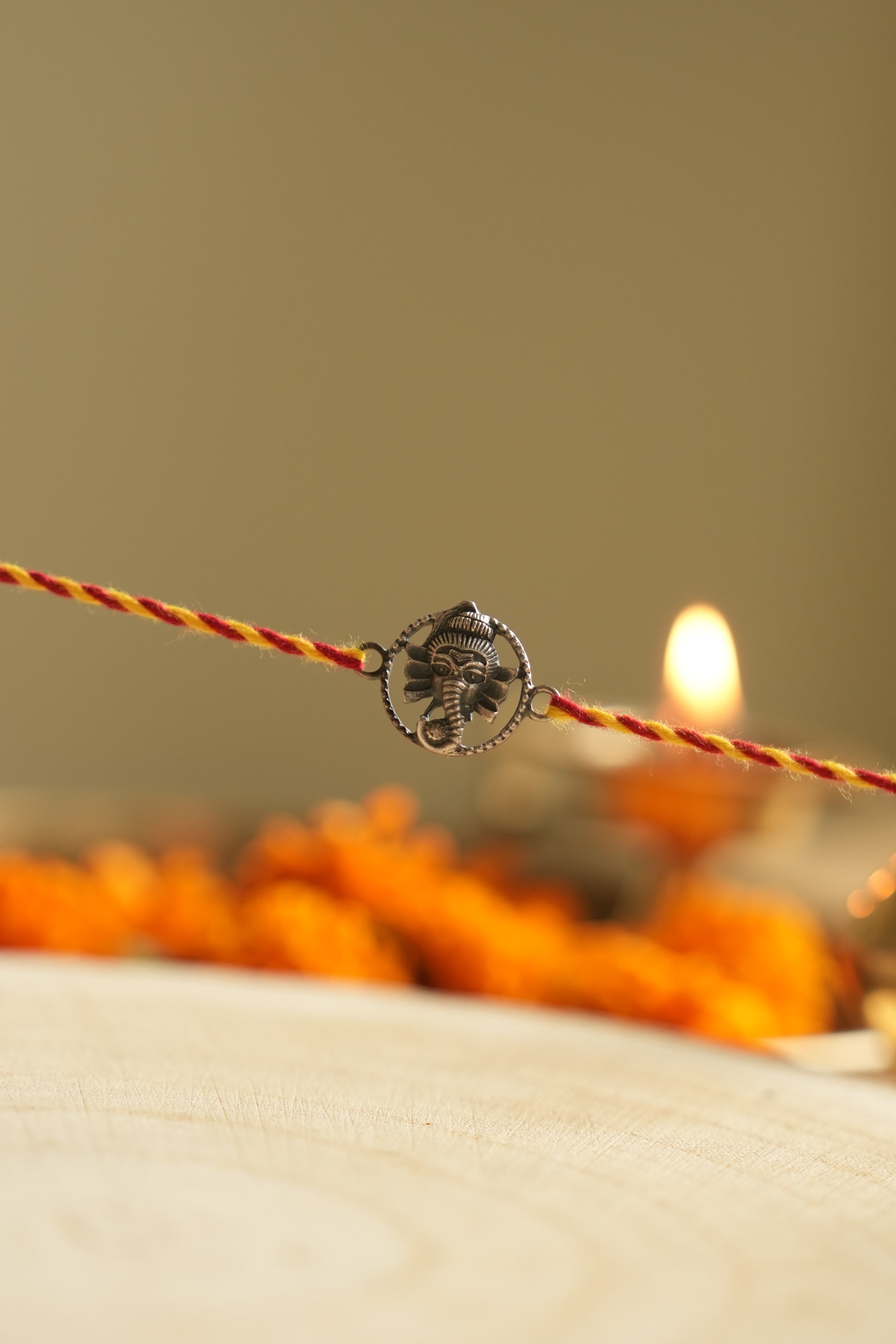 silver ganesh rakhi