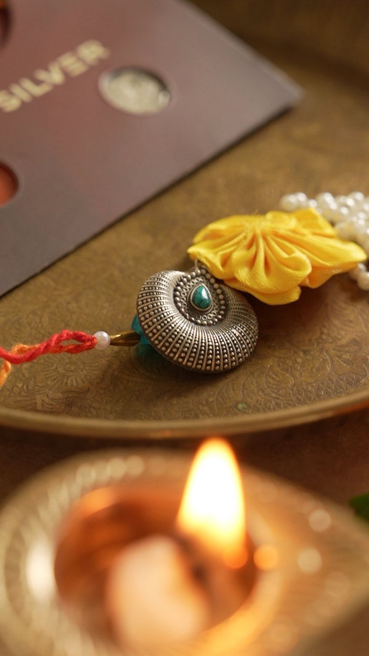 silver lumba rakhi 