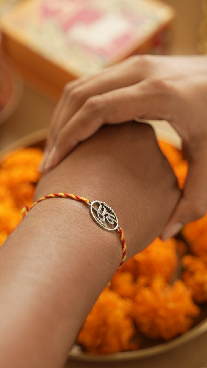 silver shree rakhi