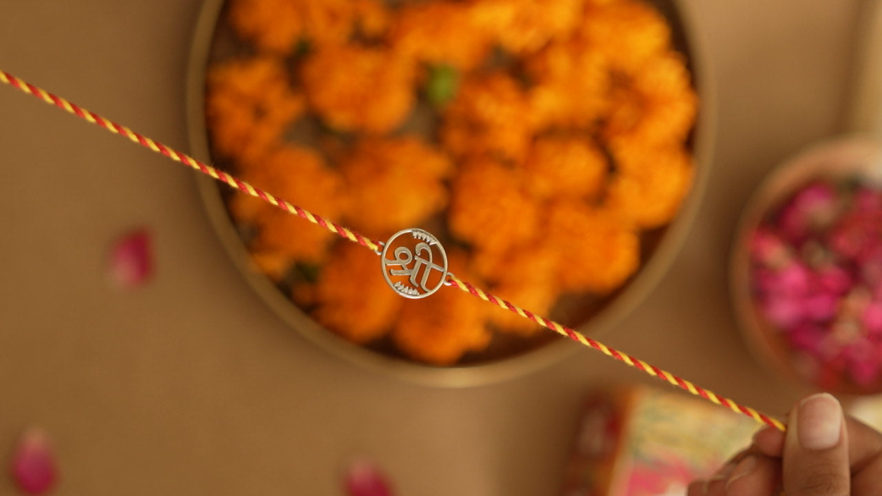 silver shree rakhi