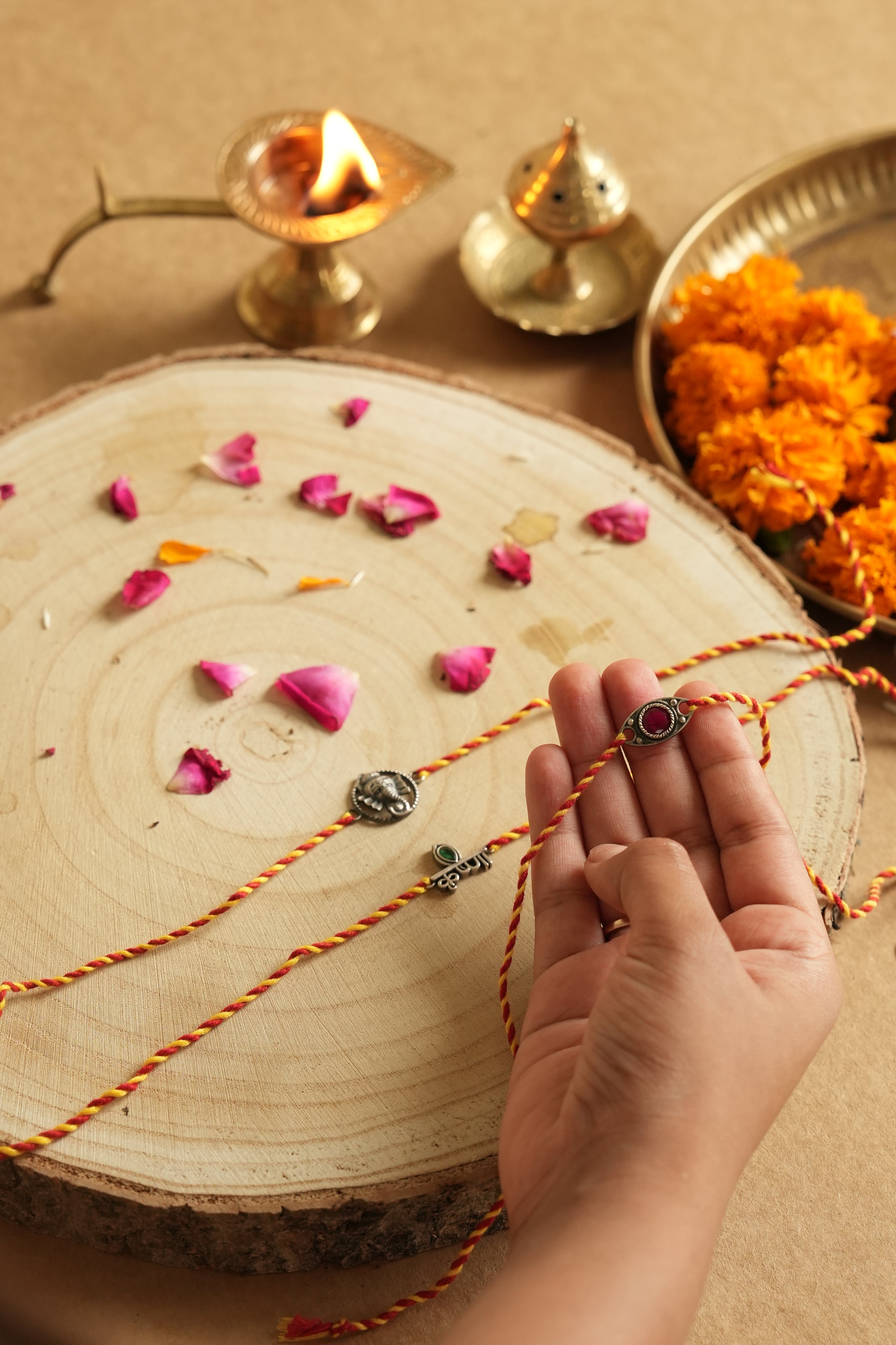silver rakhi set 
