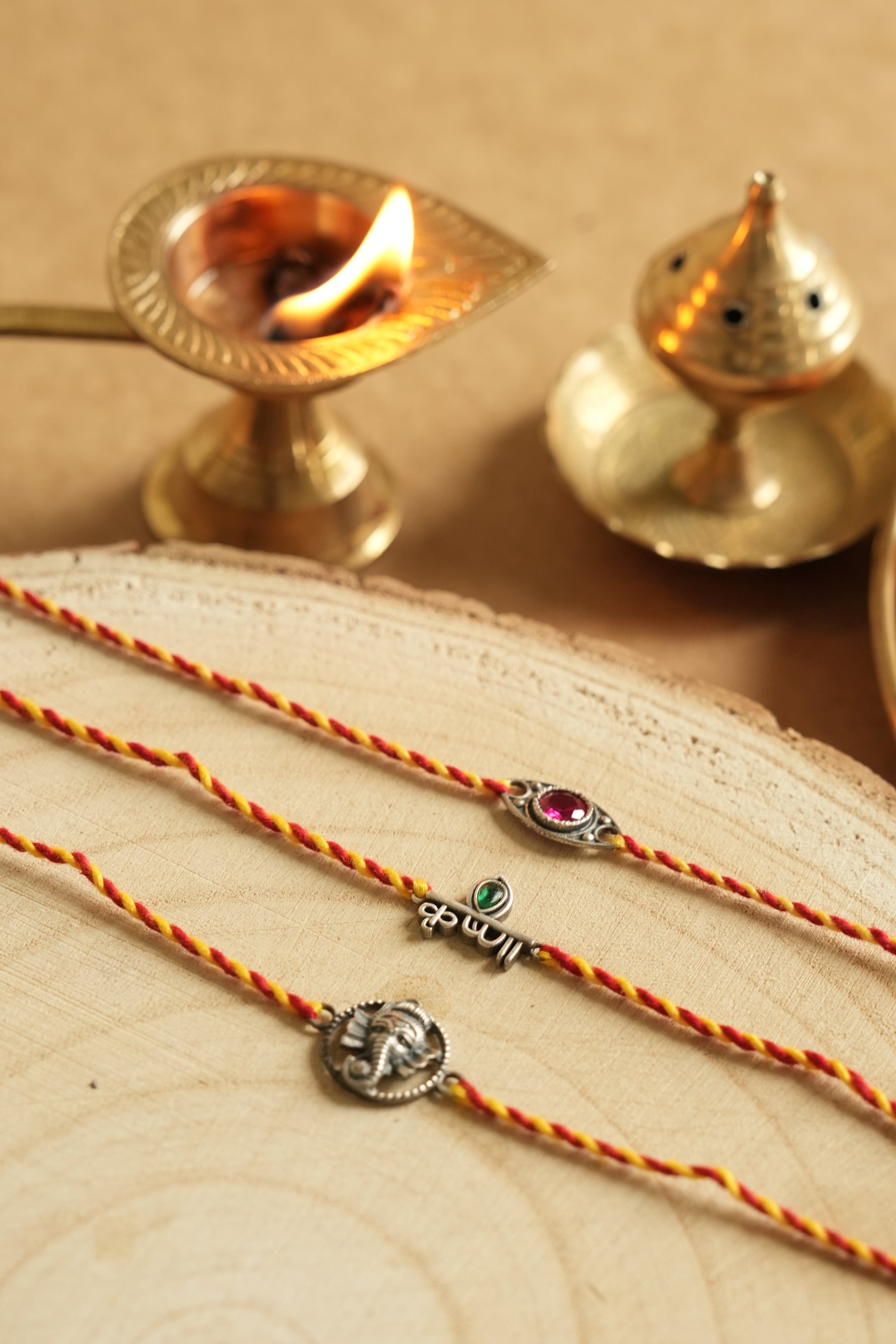 silver rakhi set