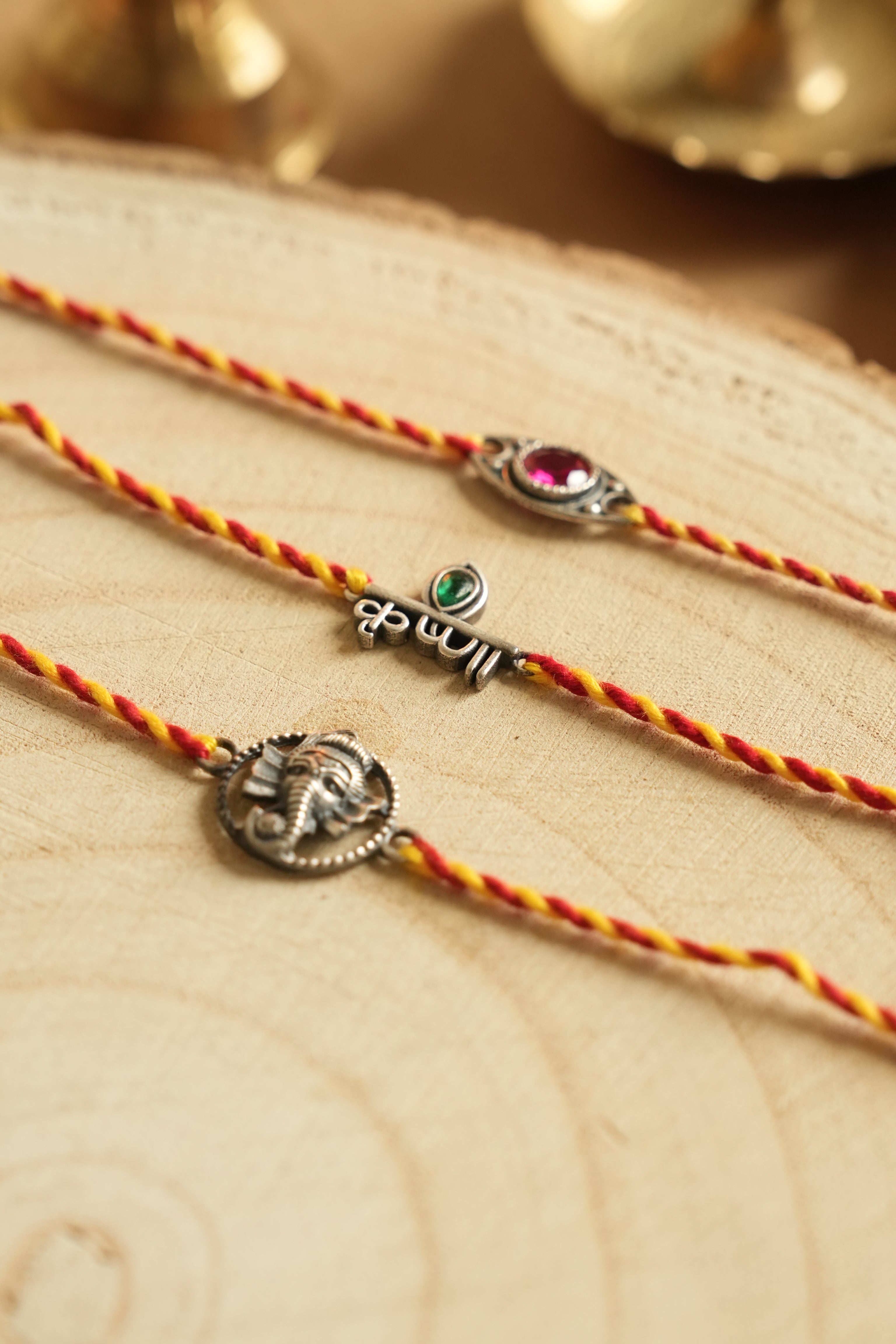 silver rakhi set 
